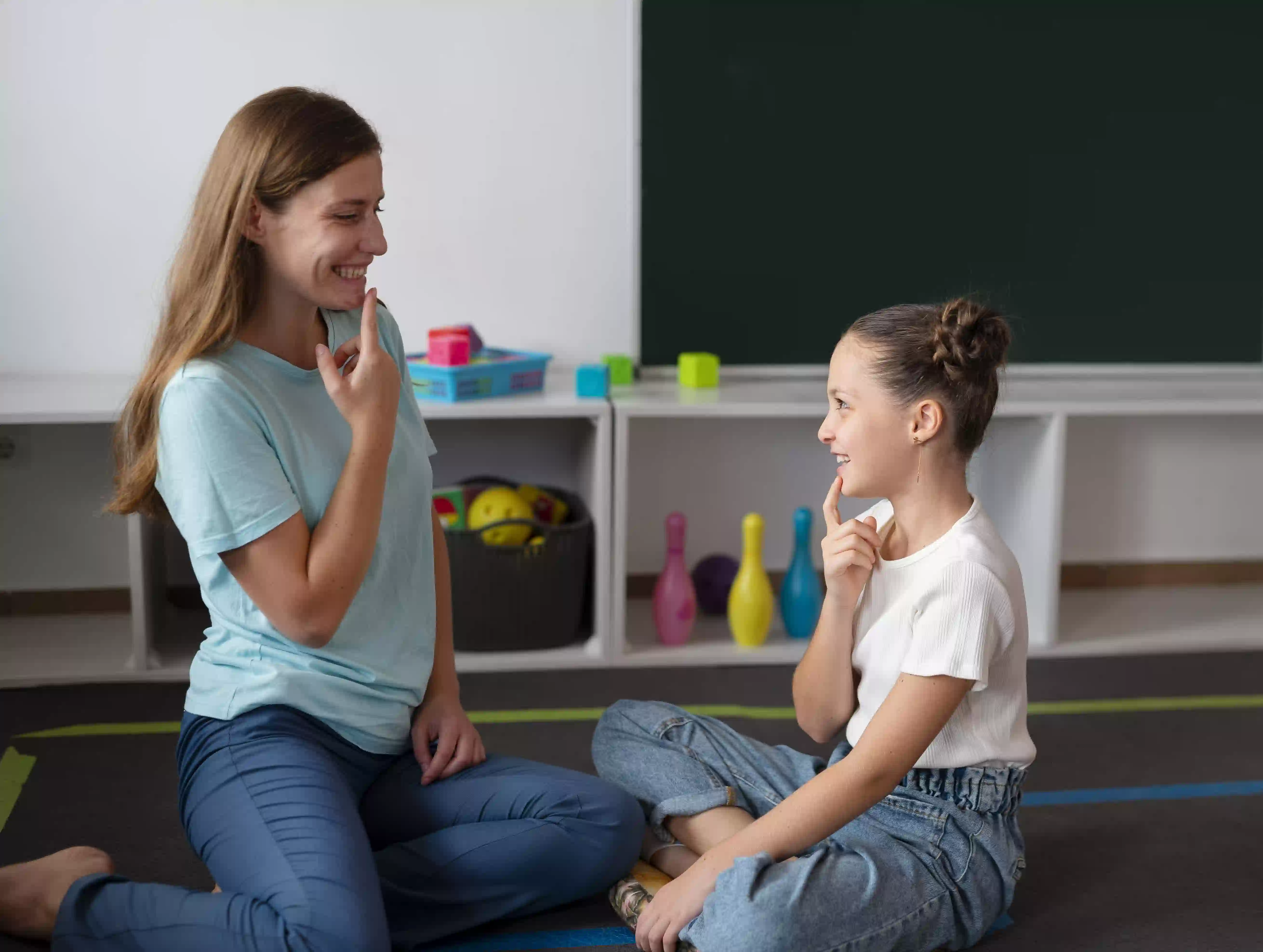 Psychologist Helping Little Girl Speech Therapy